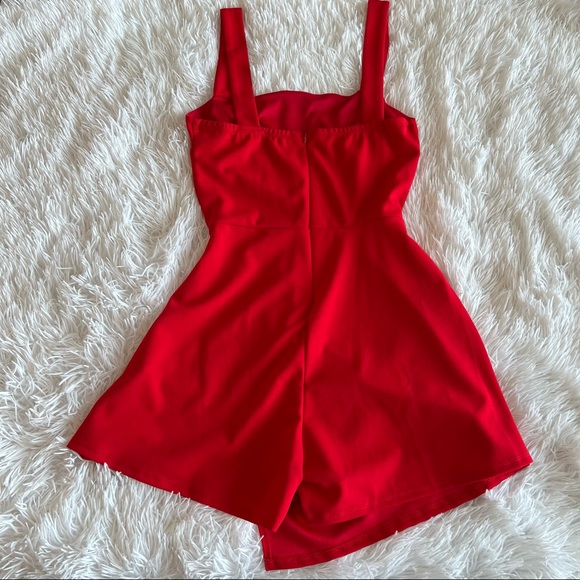 NWOT Red Overlay Asymmetrical Skirt O-Ring Romper - Picture 7 of 9